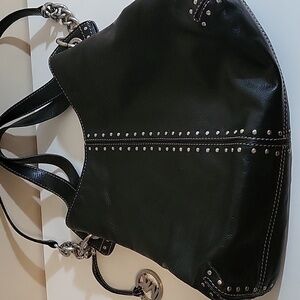 Michael Kors. Black leather bag.